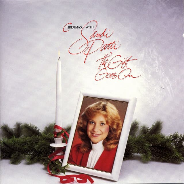 Album cover art for Christmas With Sandi Patti: The Gift Goes On