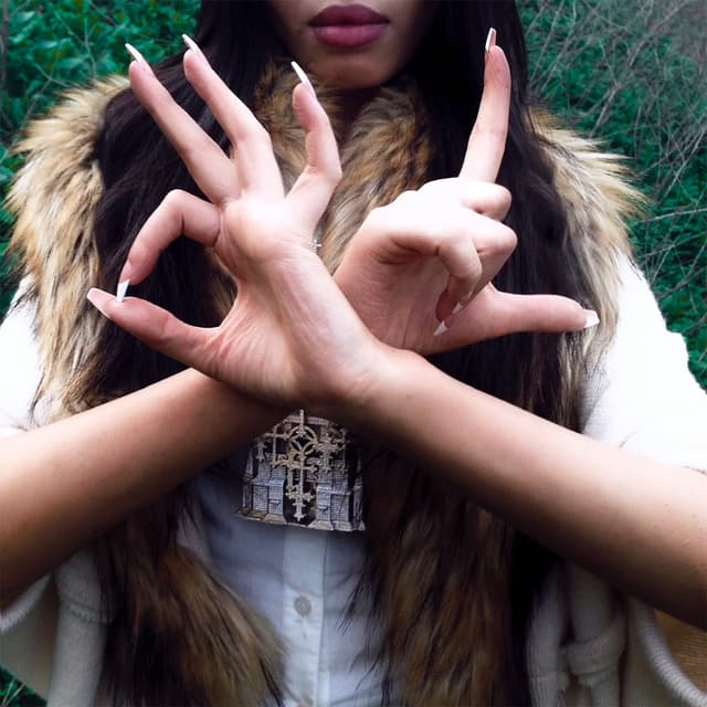 Album cover art for LEYENDA