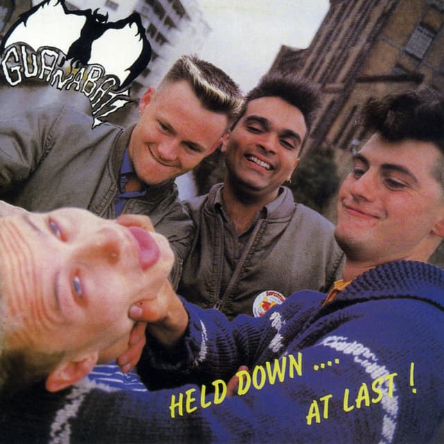 Album cover art for Held Down To... At Last