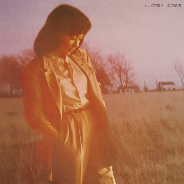 Album cover art for 十二月の旅人