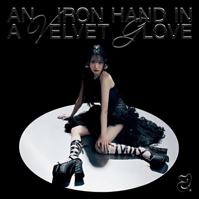 Album cover art for An Iron Hand In A Velvet Glove
